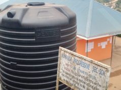 Old Students Donate Water Tank, Text Books to Muhanga Progressive S.S