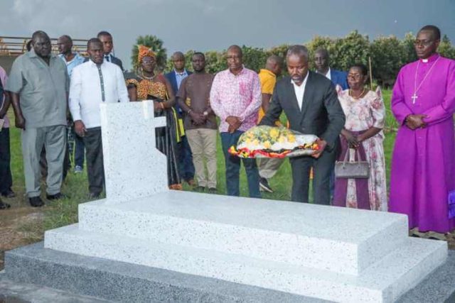 Tayebwa laying a wreath at the tomb of Lt Col Patrick Opio Awany