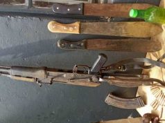 Man Arrested with Gun, Pangas and Petrol in Kampala Bus Park