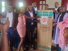 Manchester United Family Rukungiri chapter donates Refrigerator to newly installed Kakinga Archdeacon Ven. Andrew Kananura