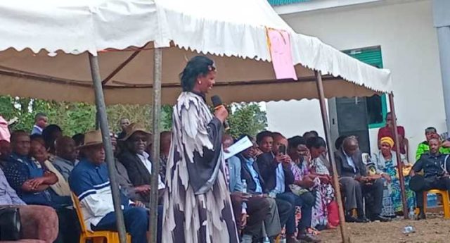 Canon Suzan Muhwezi speaking at the burial of the late Christine Ndungi Bakaihahoki