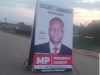 Rushenyi NUP aspirant Kamugira’s campaign poster erected in the middle of the road