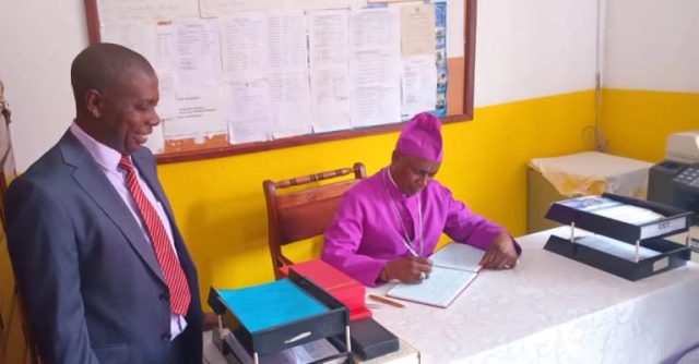 Zoreka and Headteacher Dan Byabasheija