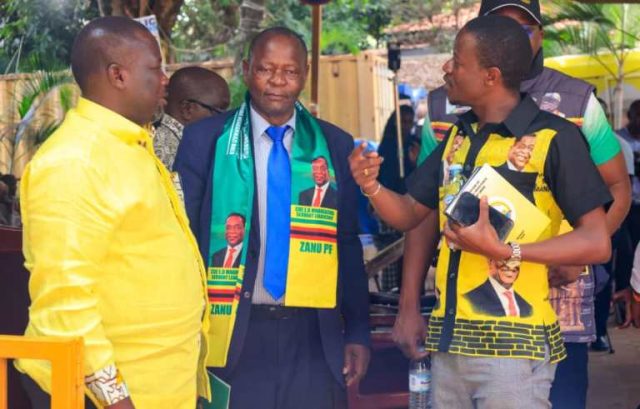 Todwong share a moment with ZANU-PF Party Secretary for External Relations Abedinico Ncube