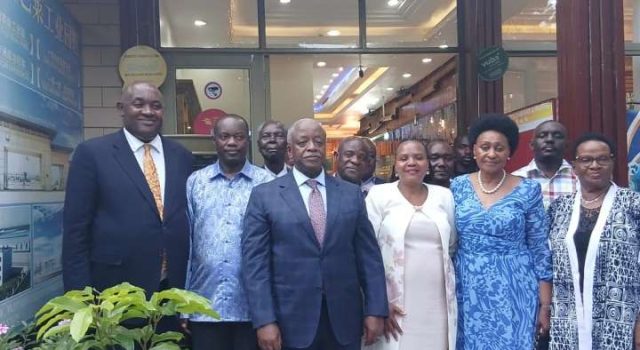 Rt Hon Amama Mbabazi congratulates Dr Chris Baryomunsi