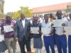 Hon Hunter Byenjeru Tukahirwa delivers laptops to improve ICT education in schools