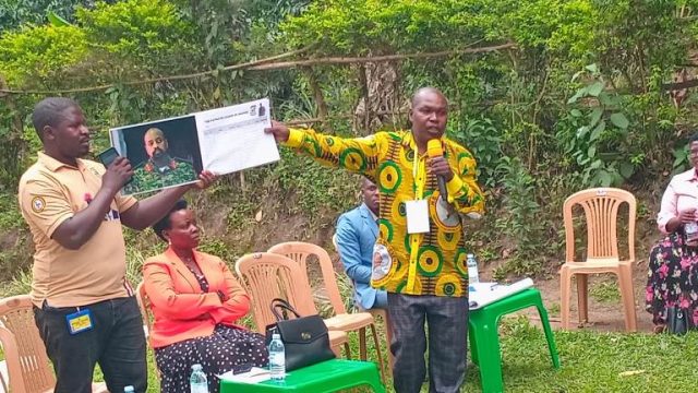 Kanungu PLU Leaders display the Gen Muhoozi Promotes endorsement book